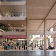Render of inside a timber building at the Amstel Design District by Mecanoo