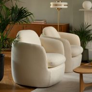 Cream-coloured chairs in living room