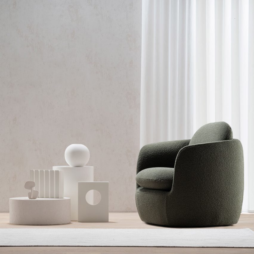 Grey-green chair in light room
