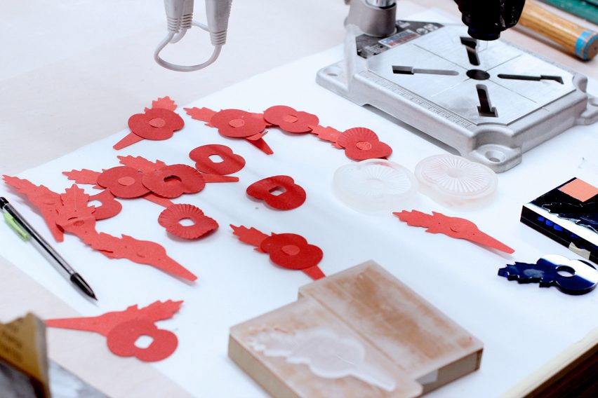 Dismantled paper poppies on a desk