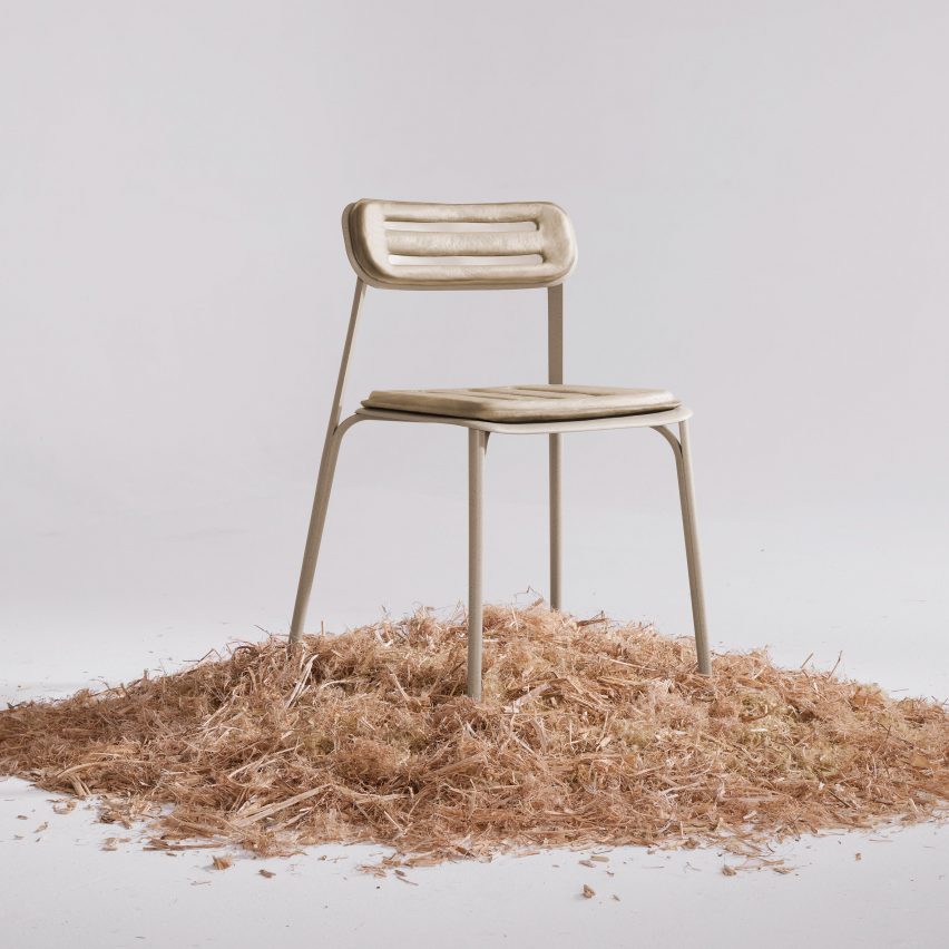 Frontal view of PEEL chair by Prowl Studio on a bed of woodchips