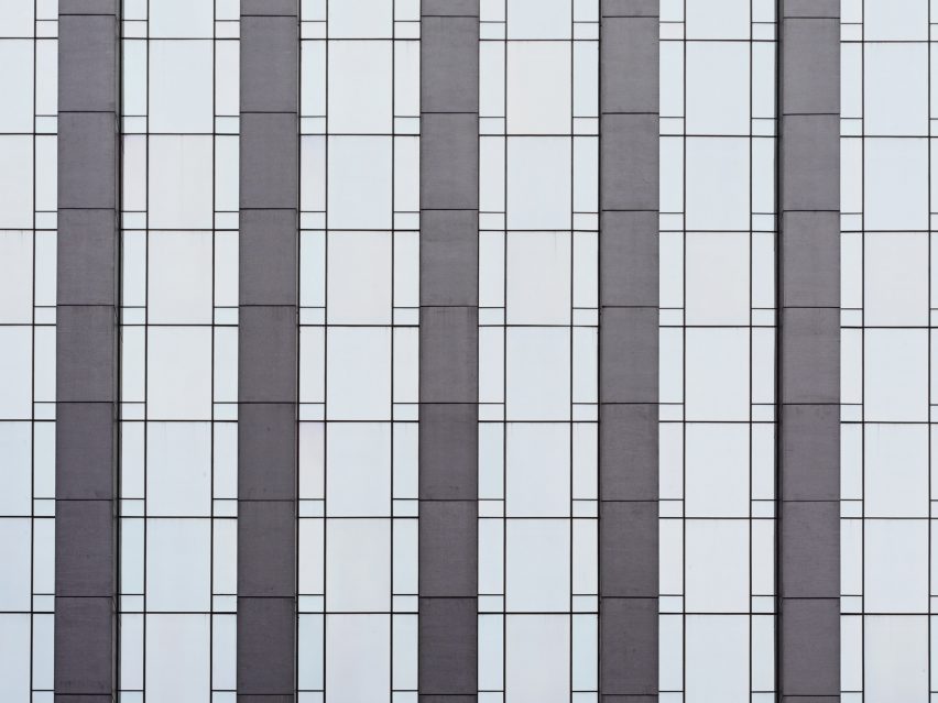 Detail of glass and concrete skyscraper facade