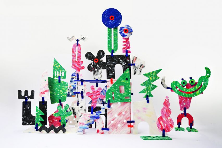 Photo of a toy city built from a multi-coloured kids' construction set