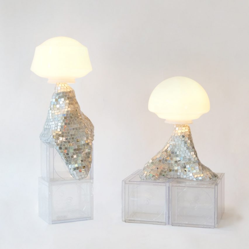 Image of two lamps on perspex boxes that have glitterball-like bases