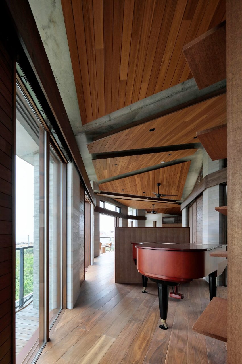 Wood and concrete interior of Villa MKZ by Takeshi Hirobe Architects