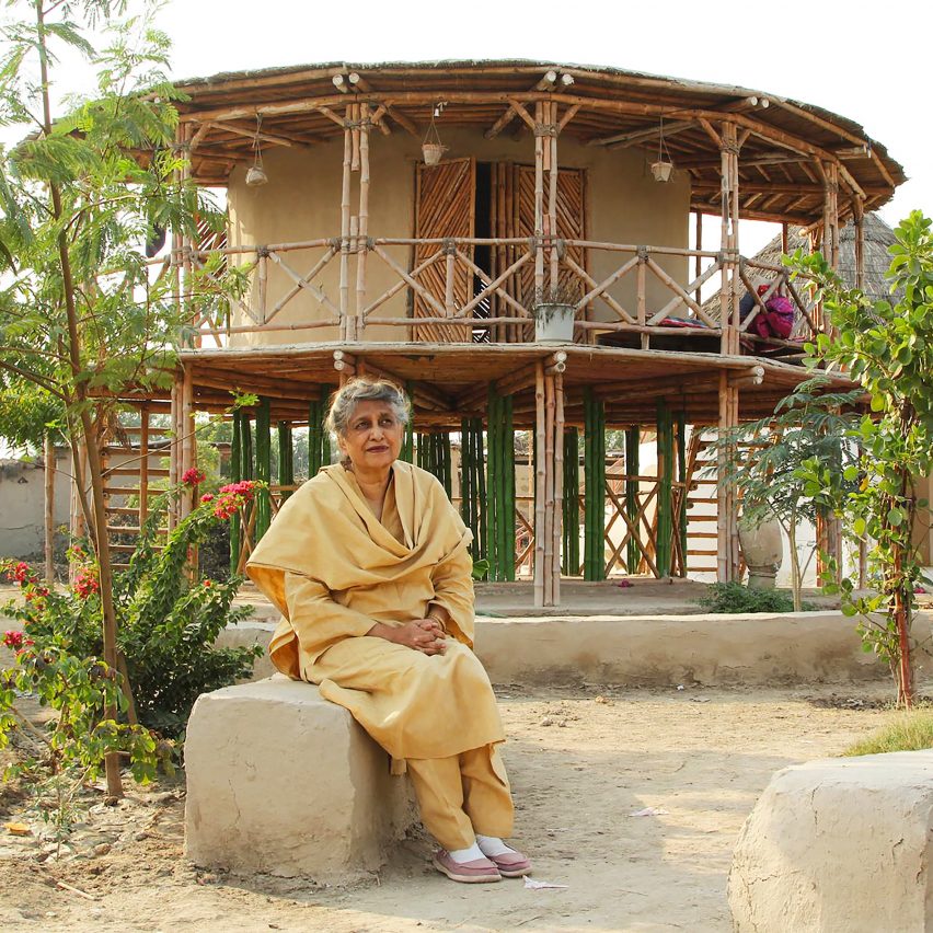 Yasmeen Lari sat in front of the Women's Centre bamboo circular building in Pakistan