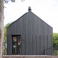 Gable end of a black timber home