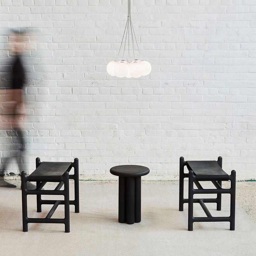 Black furniture and stool by Anony