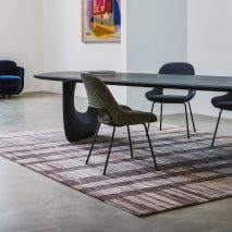 Photo of chairs, a table and a rug