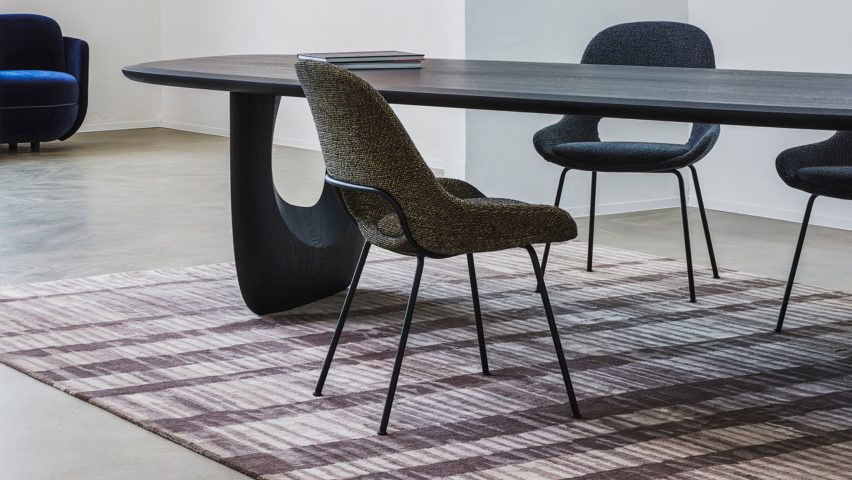 Photo of chairs, a table and a rug