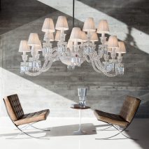 Photo of a Baccarat chandelier above two chairs