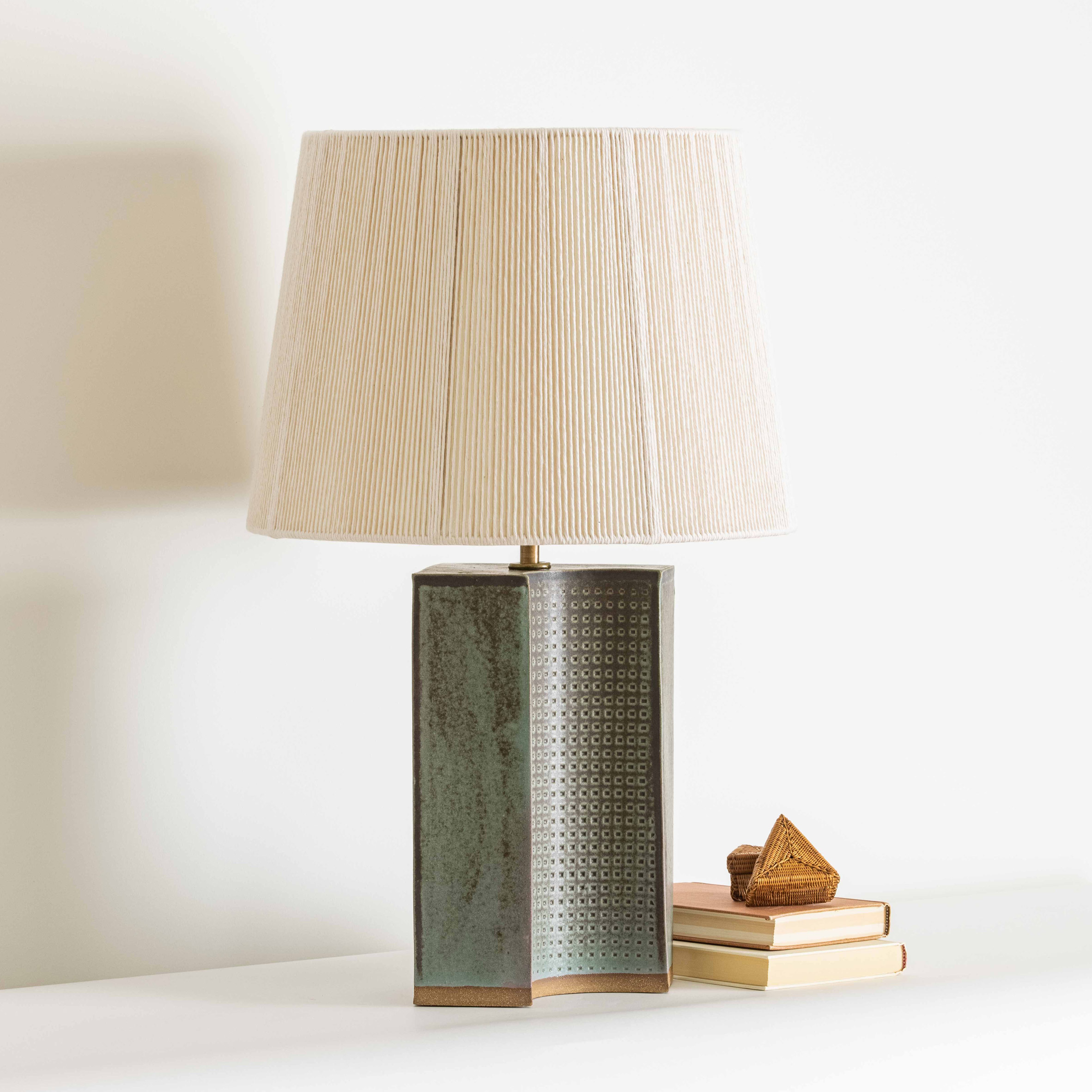 Lamp design with punctuated holes