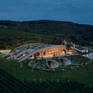 Aleš Fiala blends Czech winery into landscape beneath curved green roof