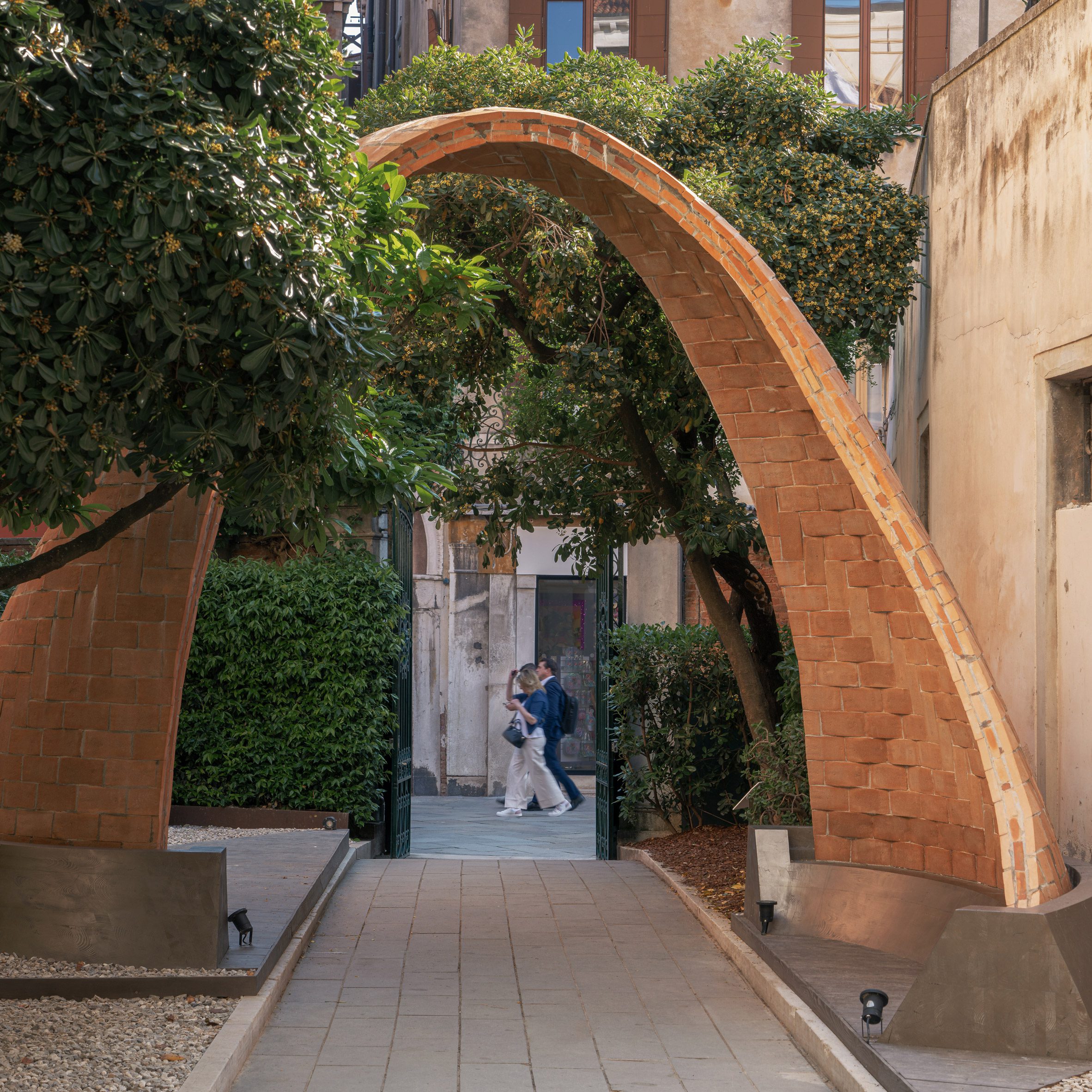 Photo of the arch in the entrance to the Time Space Existence exhibition in the Palazzo Mora gardens