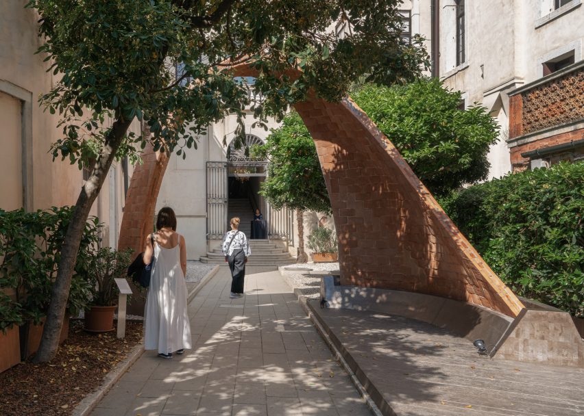 Photo of the Angelus Novus Vault with people walking under it at the Venice Architecture Biennale