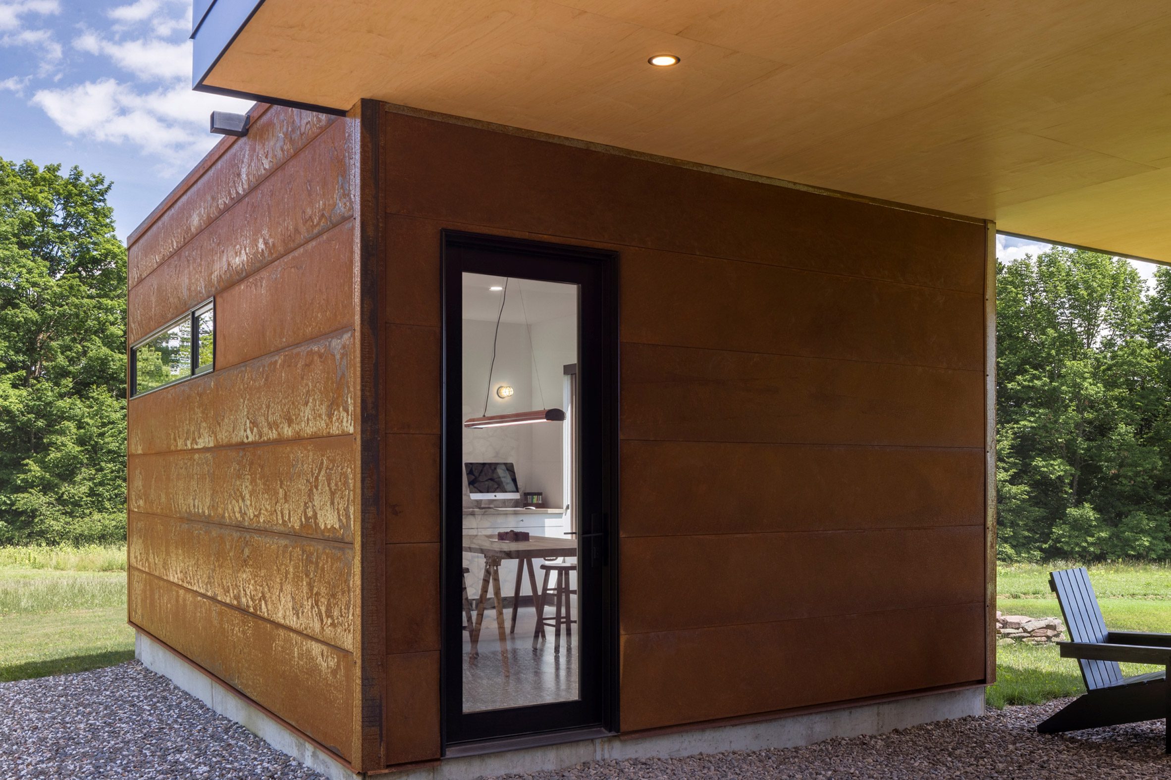 Corten steel cladding by Studio MM on dogtrot-style house