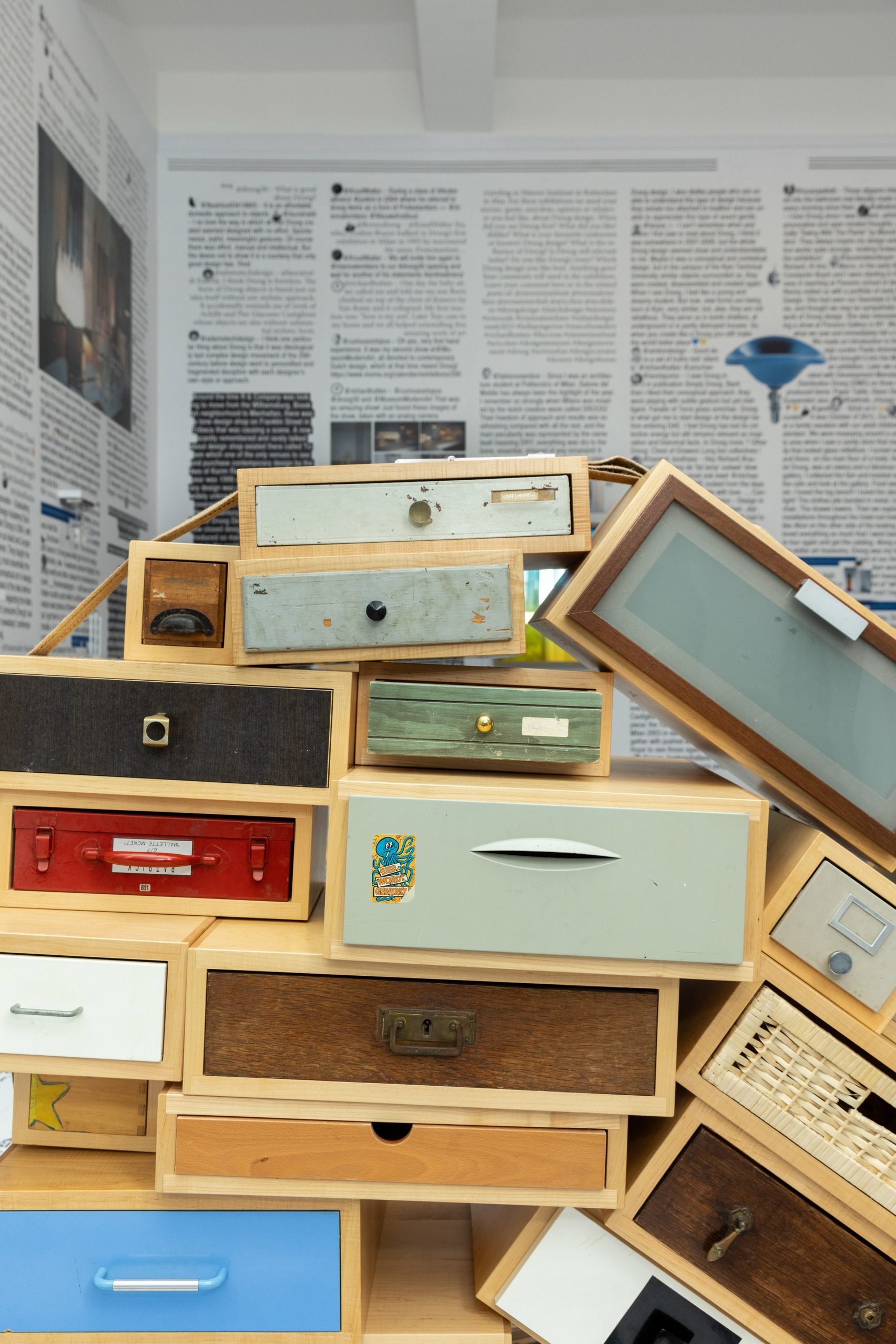 Close-up photo of some of the drawers in Tejo Remy's You Can't Lay Down Your Memory chest of drawers, bound together with a strap