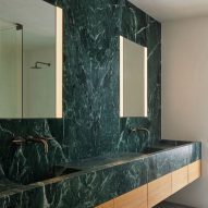 Ten bathrooms where marble lines the walls