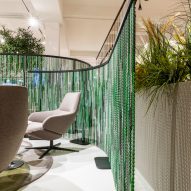 Feel Free chain curtain room divider by Kriskadecor in an office