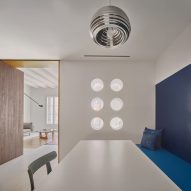 Dining room interior of Girona Street apartment in Barcelona, designed by Raúl Sanchez Architects
