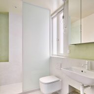 Bathroom interior of Girona Street apartment in Barcelona, designed by Raúl Sanchez Architects