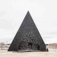 Dezeen Agenda features black timber pyramid by David Adjaye