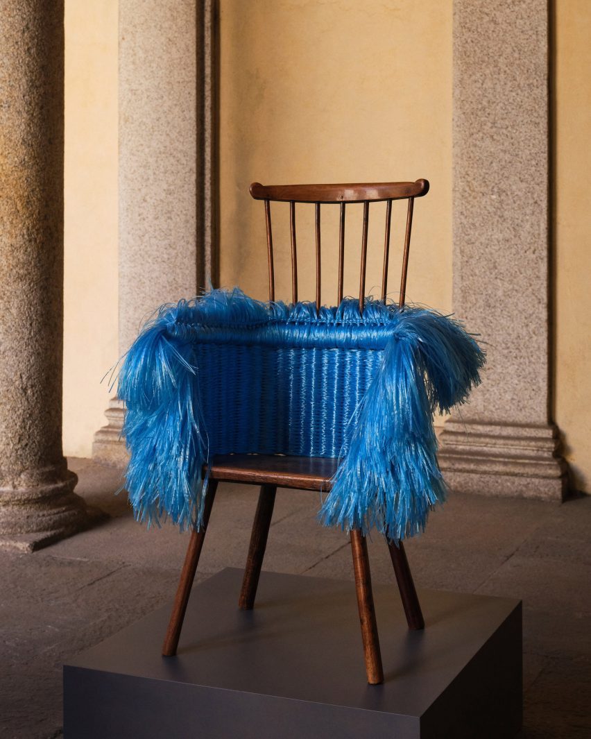 Blue tasselled chair by Loewe