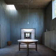 Table and corner skylight in Luna House by Pezo von Ellrichshausen