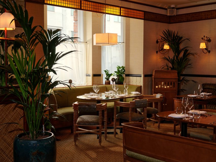 Dining area in restaurant in London by Pirajean Lees