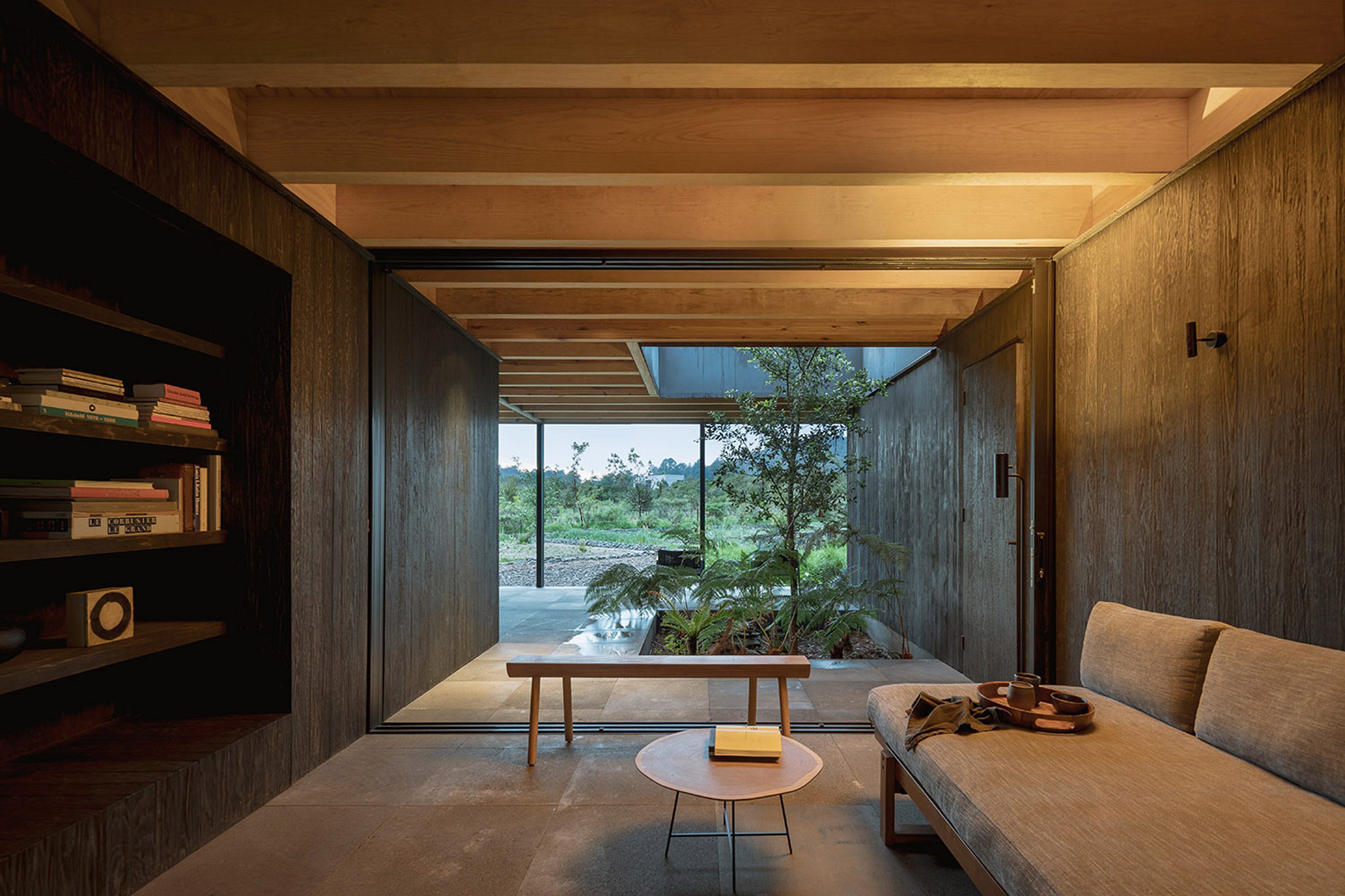 Communal area within main house of Rain Harvest Home by Robert Hutchinson Architecture and JSa