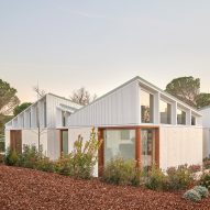 Arquitecturia designs Catalan house as cluster of pavilions around garden