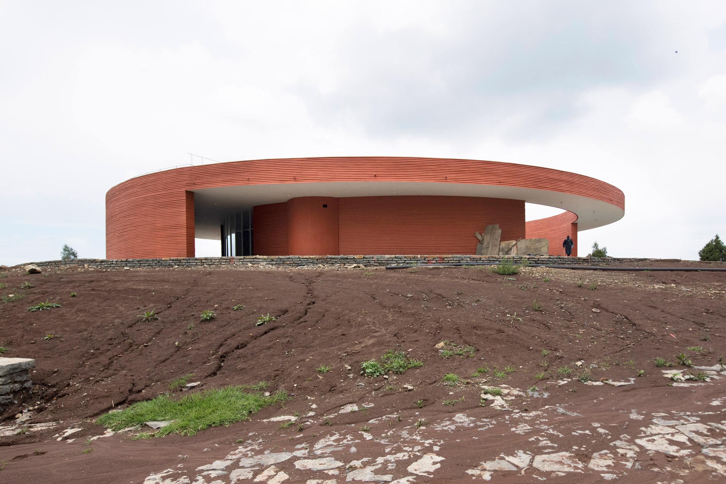 Orange circular outlook building at the Meles Zenawi Memorial Park by Studio Other Spaces