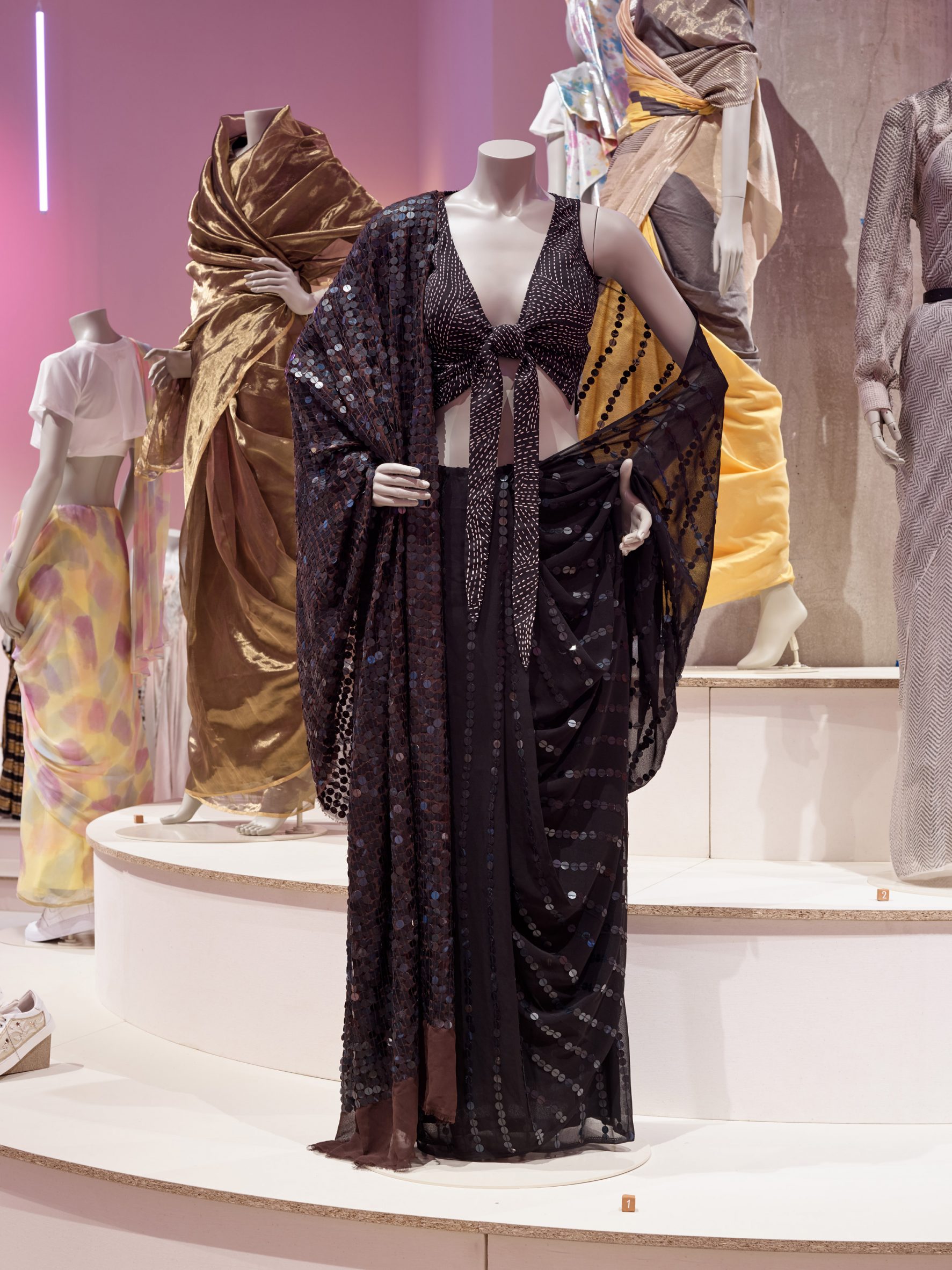 A sari embellished with sequins made from recycled X-ray film