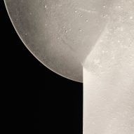 Detail of cloudy white lamp on dark background