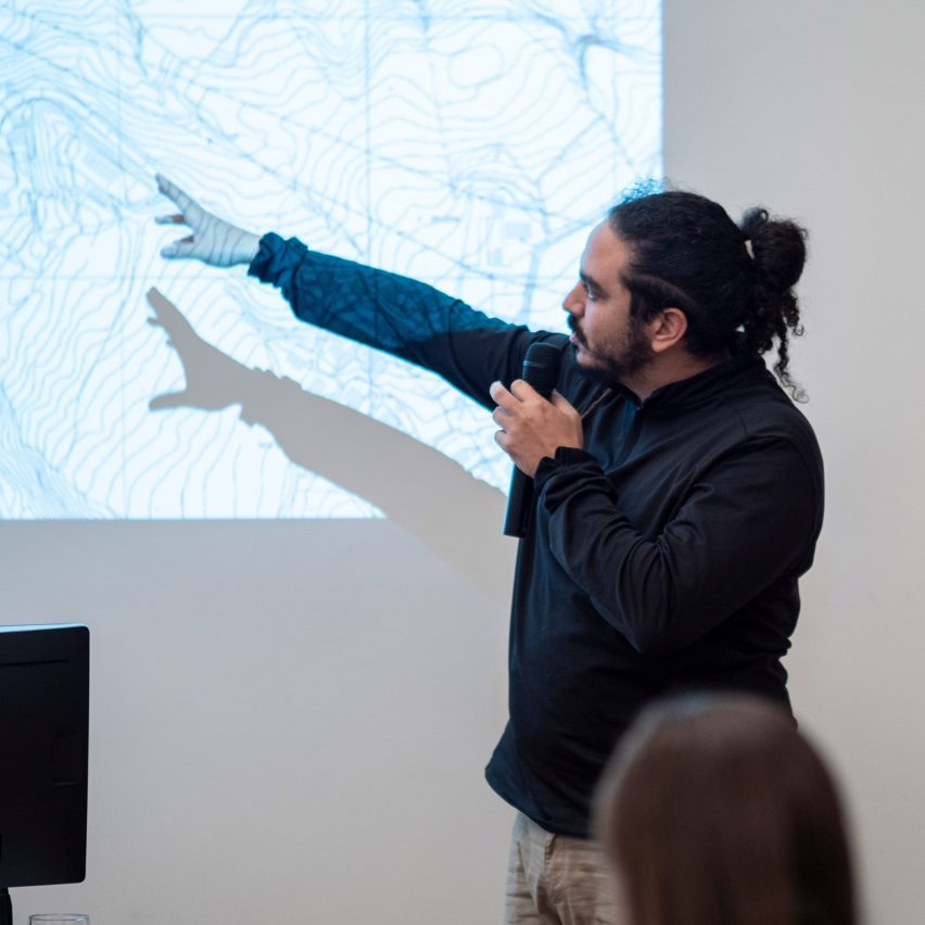 a photograph of a person doing a presentation