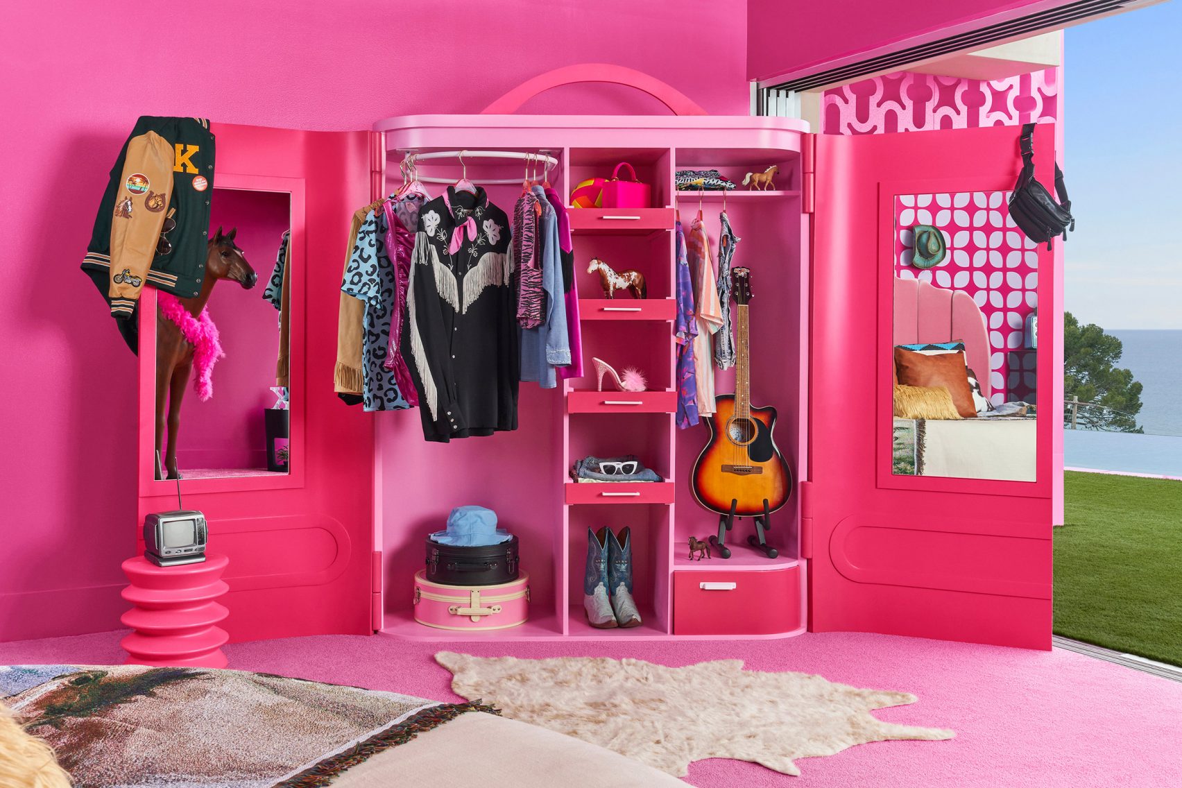 Barbie and Ken unveil bright-pink lifesize dollhouse in Malibu