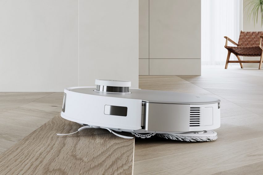 The device vacuums and mops throughout the home
