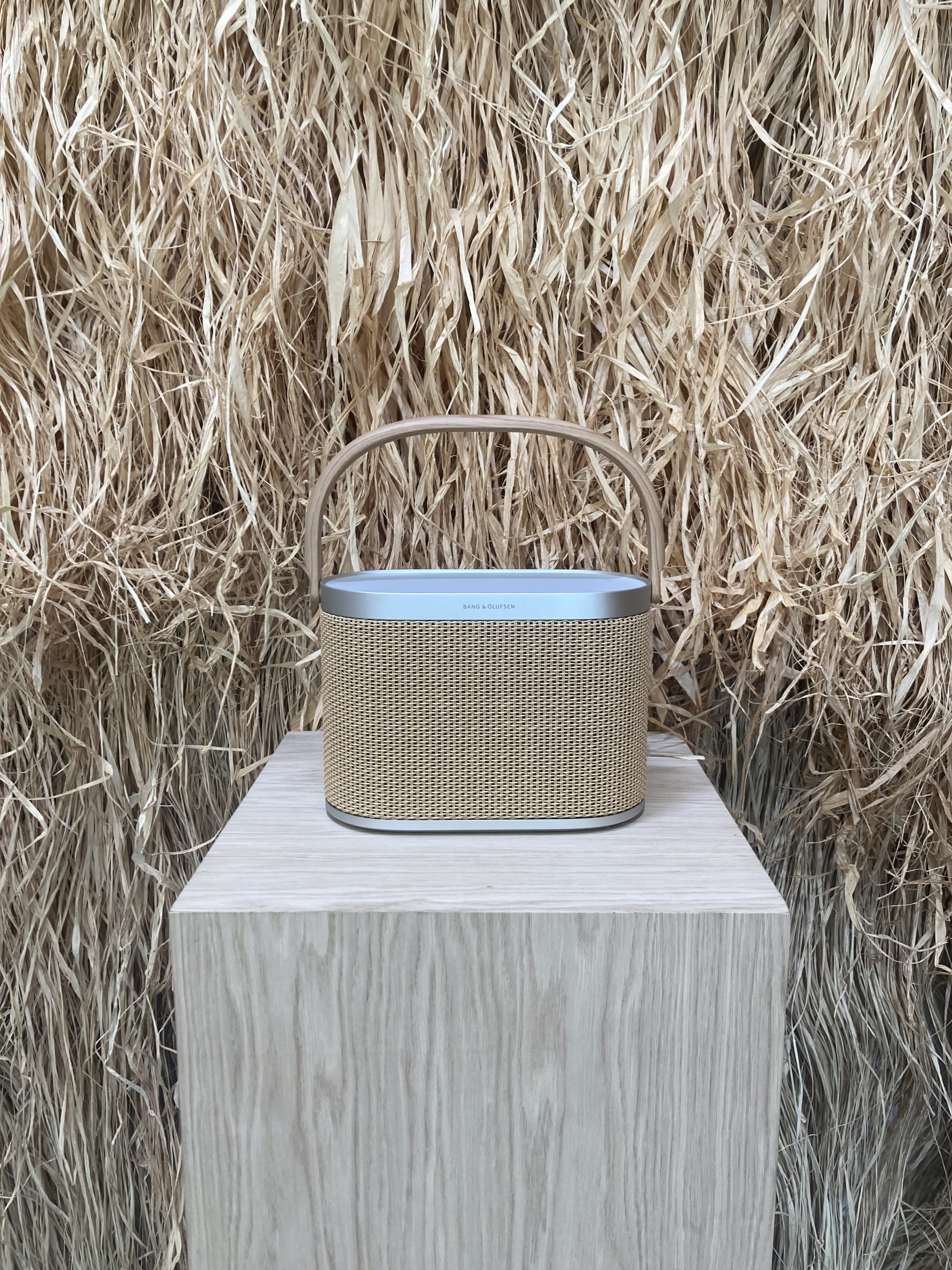 Beosound A5 features modular covers made from paper raffia and oak lamellas