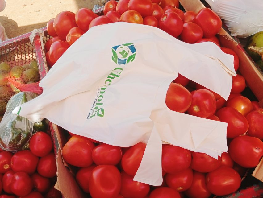 Chemolex bioplastic bag on a pile of tomatoes from Afri-Plastics Challenge