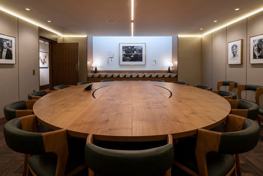 Boardroom with round desk by Benedetti Architects