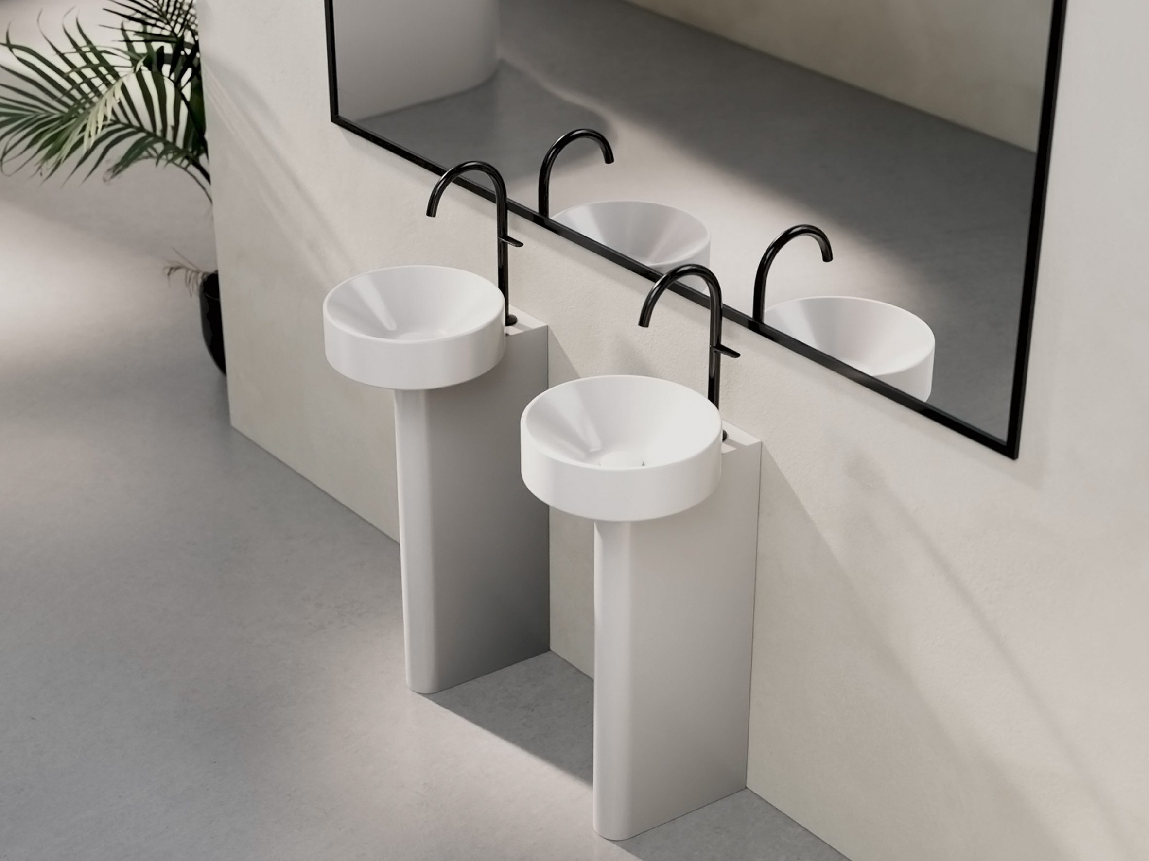 BetteSuno basins in front of a mirror