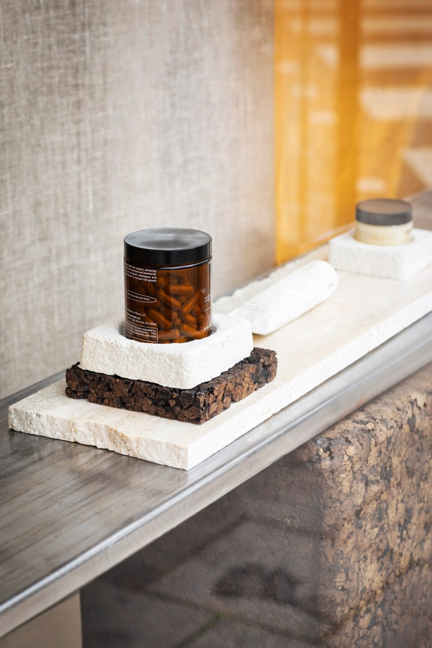 display shelf of salvaged steel, expanded cork and stone off-cuts