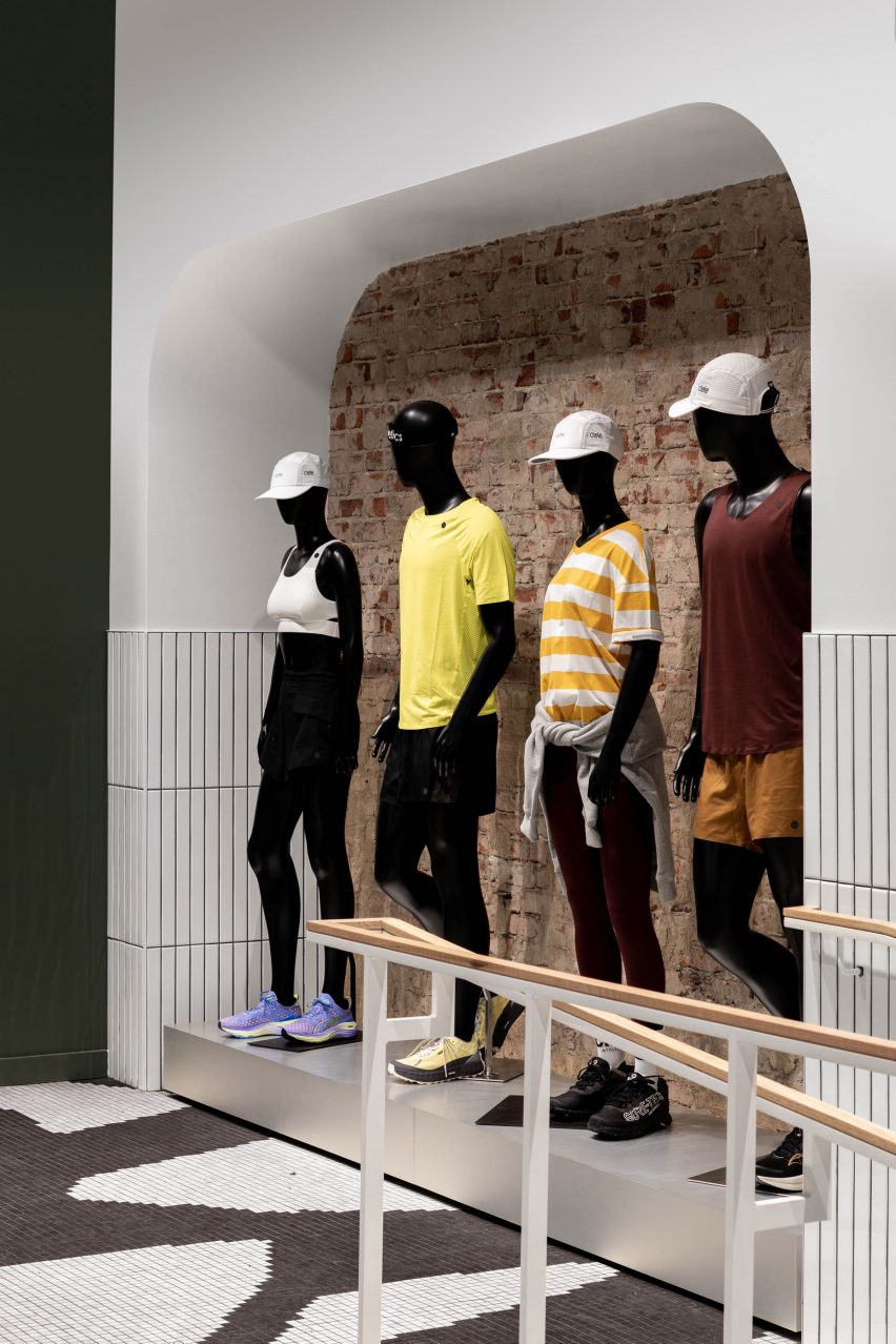Four mannequins within a wall niche