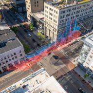 Janet Echelman uses 78 miles of fibre to create sculpture above Columbus intersection