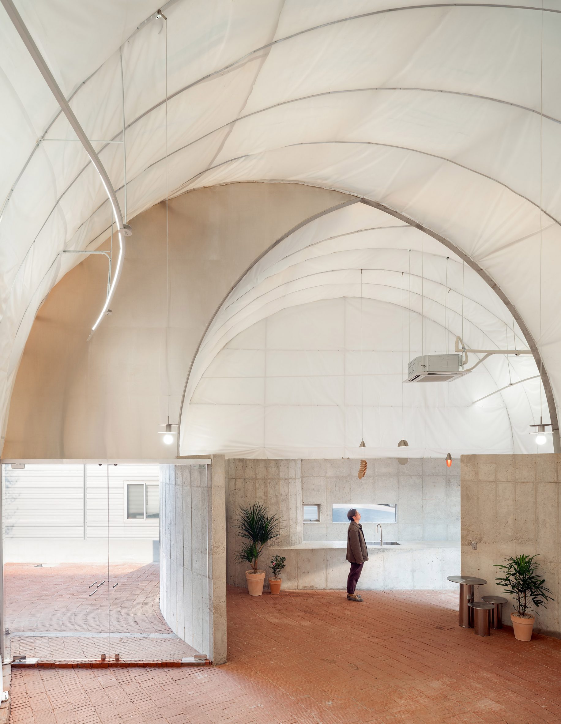 Office relaxation space with translucent curved roof