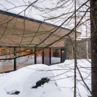 Stephane Gaulin-Brown places curved roof on Quebec chalet