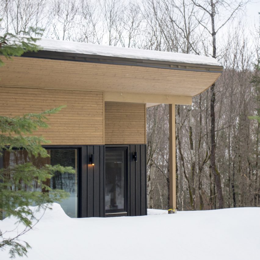 Wooden ski chalet with sloping roof