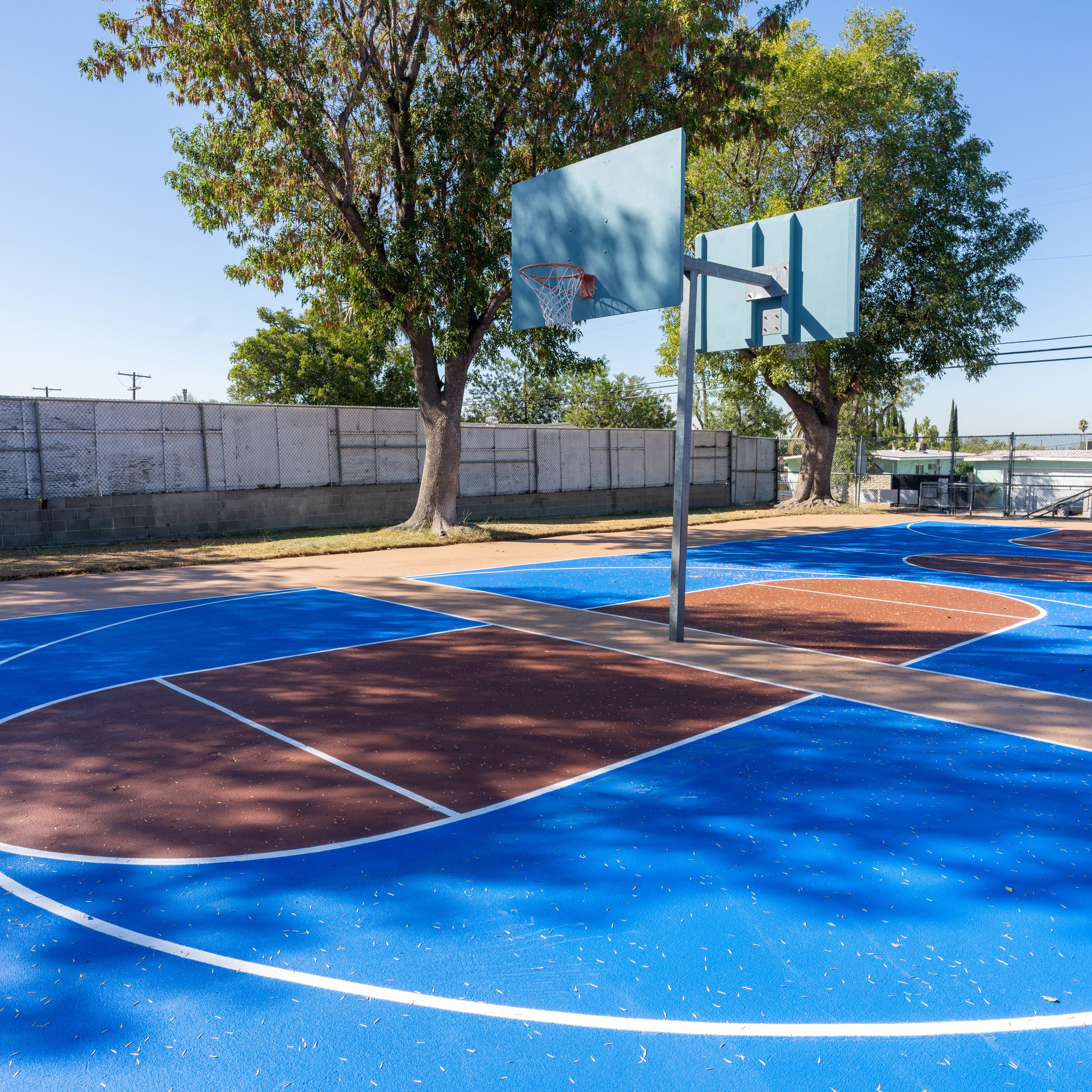 Basketball court with solar reflective coating