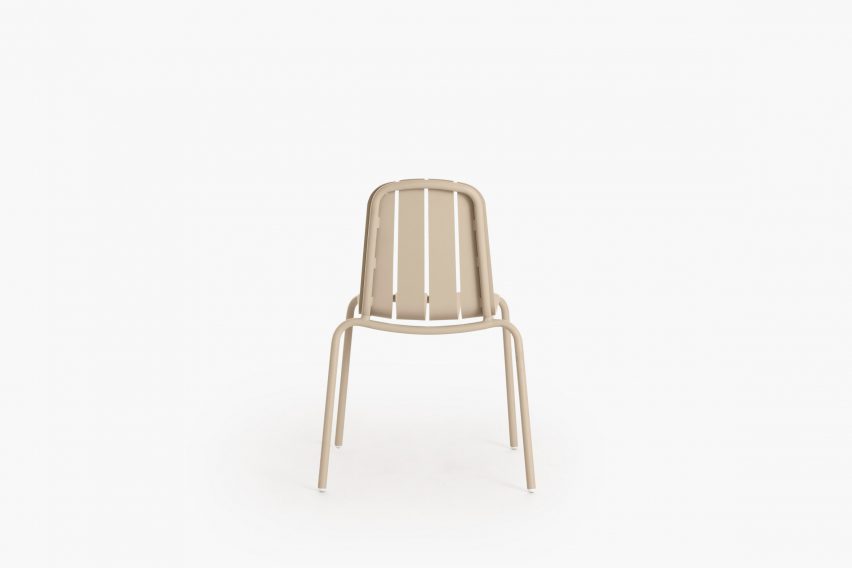Beige chair on white backdrop