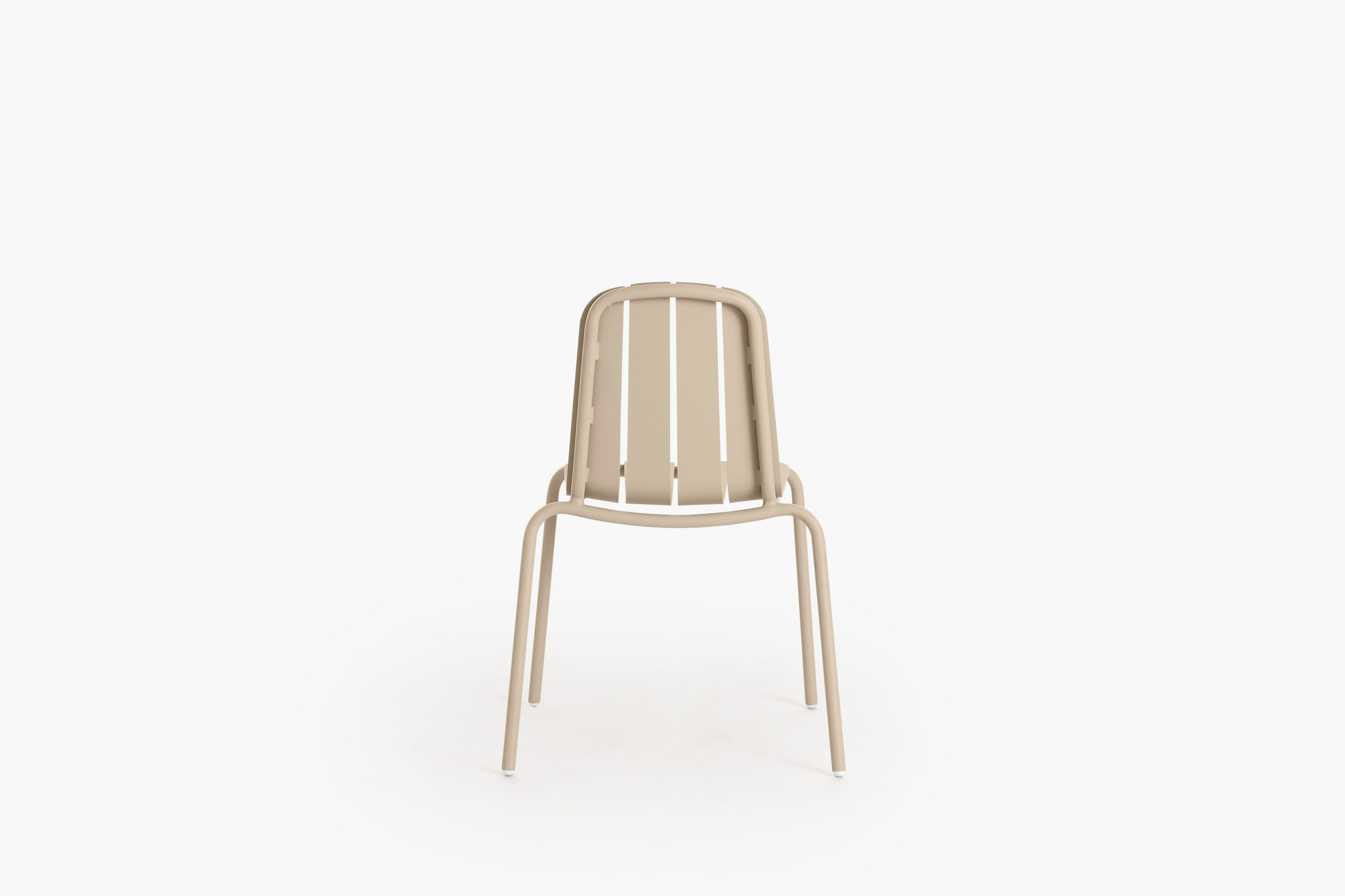 Beige chair on white backdrop